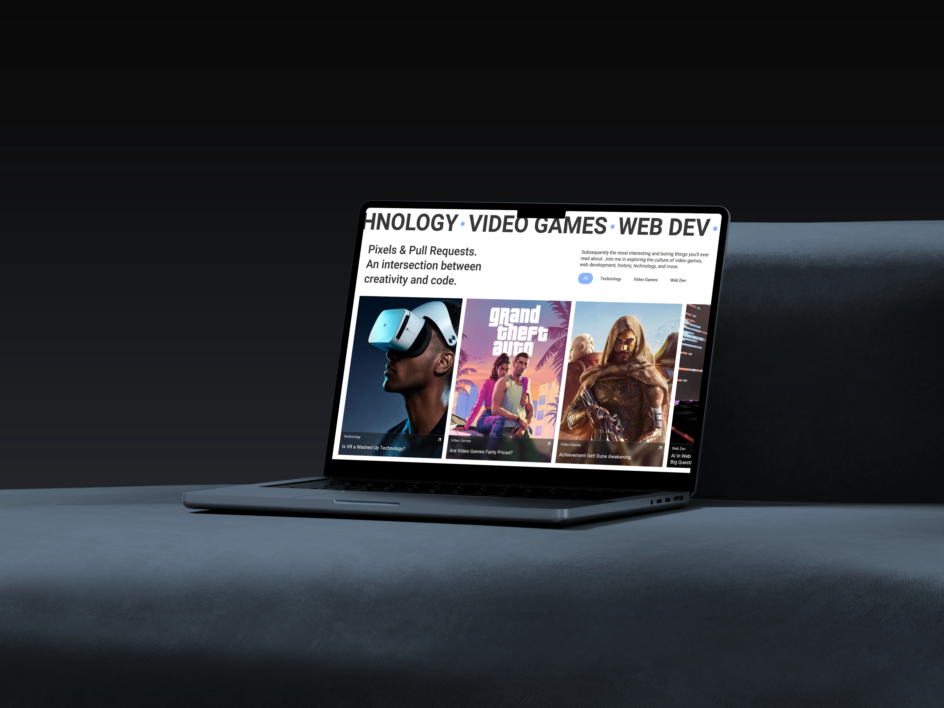 A tinted laptop on a black couch in a dark gray room. On the laptop screen is a preview image for the Pixels & Pull Requests Blog.